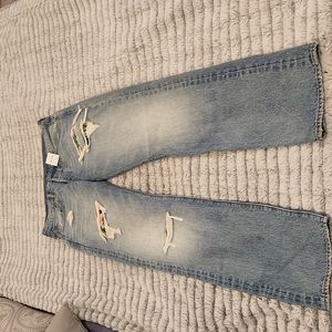 Levis straight leg, distressed button down jeans with floral patches size 10